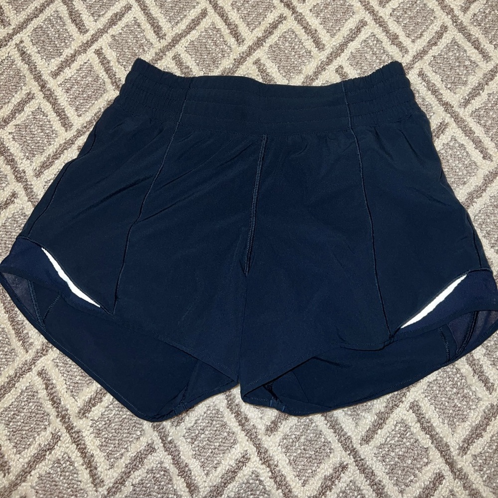 size 4 lululemon navy blue hotty hot shorts 4”